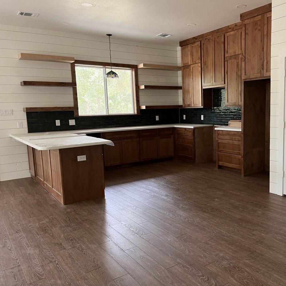 Wooden countertops with subway tile wall. 